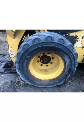 CAT 226D Equip Tire and Rim