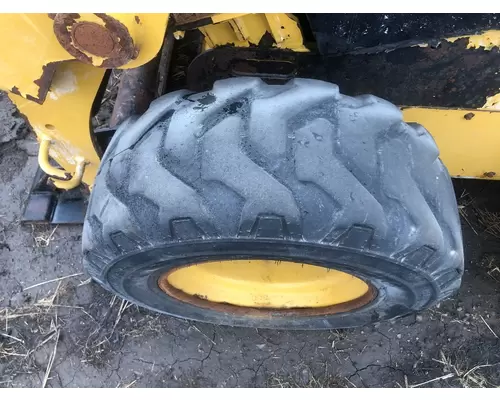 CAT 226D Equip Tire and Rim