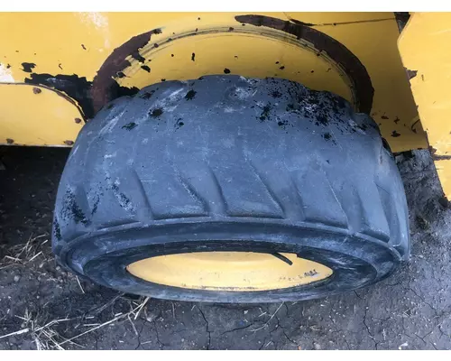 CAT 226D Equip Tire and Rim