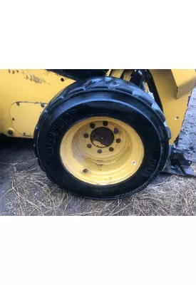 CAT 226D Equip Tire and Rim