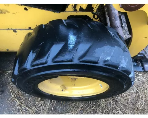 CAT 226D Equip Tire and Rim