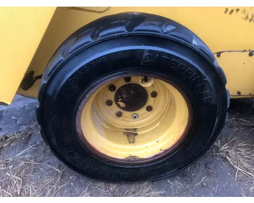 CAT 226D Equip Tire and Rim