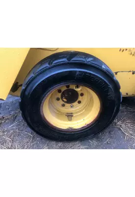 CAT 226D Equip Tire and Rim