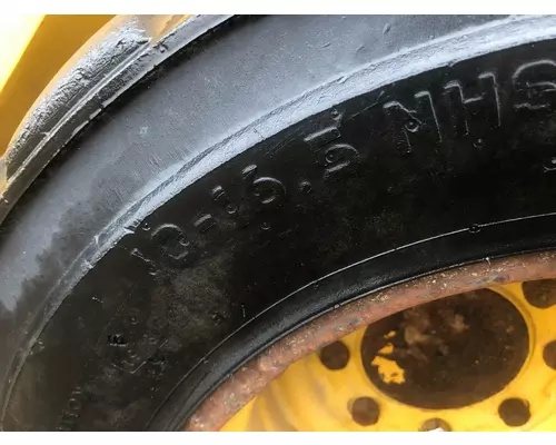 CAT 226D Equip Tire and Rim