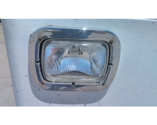 CRANE CARRIER LE HEADLAMP BEZEL