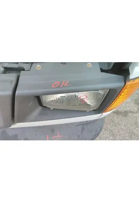 FORD E350 HEADLAMP BEZEL