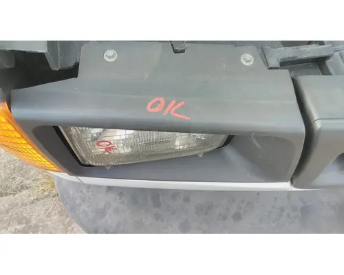 FORD E350 HEADLAMP BEZEL