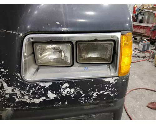 FREIGHTLINER FLD112 HEADLAMP BEZEL