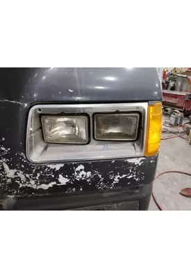 FREIGHTLINER FLD112 HEADLAMP BEZEL