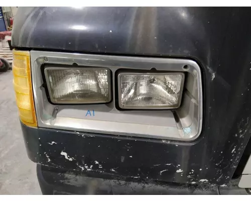 FREIGHTLINER FLD112 HEADLAMP BEZEL