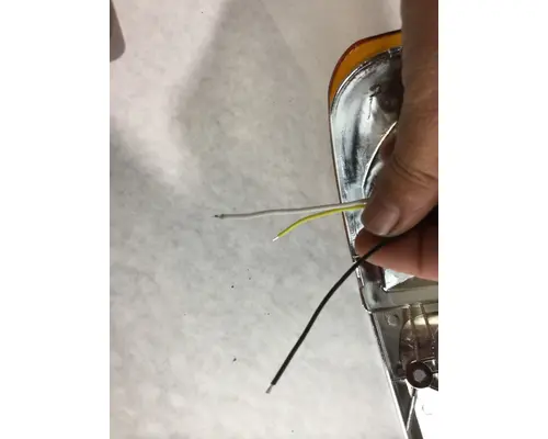 FREIGHTLINER FLD HEADLAMP BEZEL