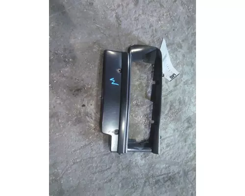 GMC T7500 HEADLAMP BEZEL