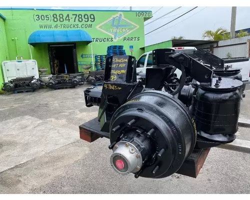 Tag Axle Hendrickson AIR DOWN SPRING UP 4-trucks Enterprises LLC