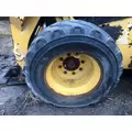 CAT 226D Equip Tire and Rim thumbnail 1